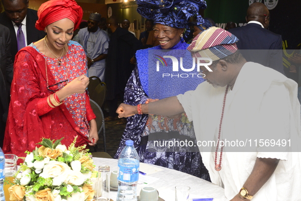 L-R: Minister of Art, Culture, and Creative Economy, Hannatu Musa Musawa; Founder, Chief Nike Art Gallery, Chief Nike Davies-Okundaye; and D...