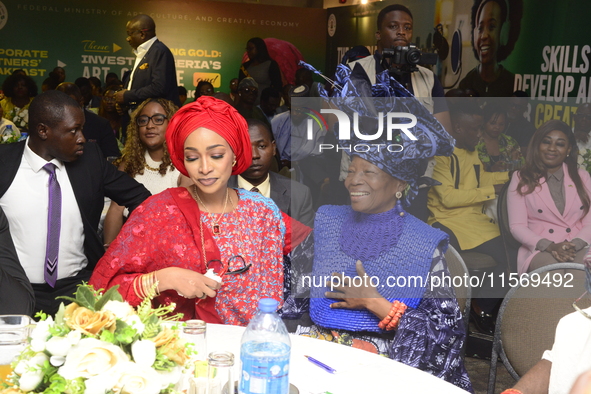 L-R: Minister of Art, Culture, and Creative Economy, Hannatu Musa Musawa, and Founder, Nike Art Gallery, Chief Nike Davies-Okundaye, during...