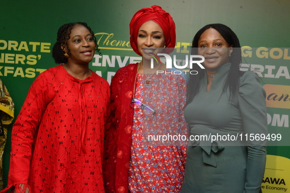 Minister for Art, Culture, and Creative Economy, Barr. Hannatu Musa Musawa (M), and guests pose for a photograph during the Ministry of Art,...