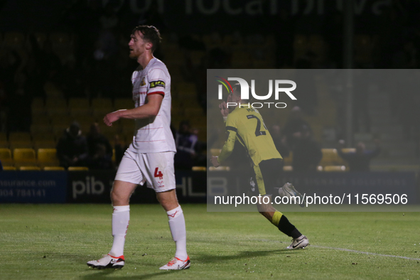 Harrogate Town's Josh March celebrates his goal as Doncaster Rovers's Tom Anderson shows dejection during the Sky Bet League 2 match between...