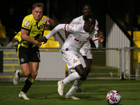 Ephraim Yeboah of Doncaster Rovers breaks away from James Daly of Harrogate Town during the Sky Bet League 2 match between Harrogate Town an...