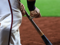 Joe Proscia #15 of New York's Bravest prepares his bat while on deck during the baseball game against the NYPD baseball team in the 'Battle...