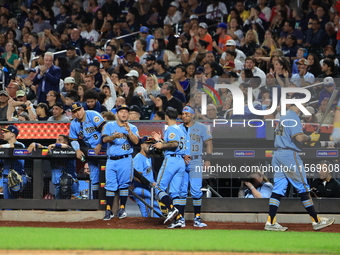 Anthony Maisano #51 of New York's Finest scores during the baseball game against the FDNY baseball team in the ''Battle of Badges'' at Citi...