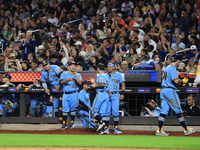 Anthony Maisano #51 of New York's Finest scores during the baseball game against the FDNY baseball team in the ''Battle of Badges'' at Citi...