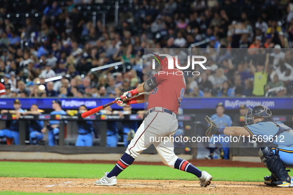 John Giakas #9 bats during the baseball game against the NYPD baseball team in the 'Battle of Badges' at Citi Field in Corona, New York, on...