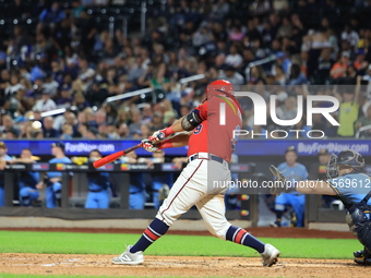 John Giakas #9 bats during the baseball game against the NYPD baseball team in the 'Battle of Badges' at Citi Field in Corona, New York, on...