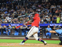 John Giakas #9 bats during the baseball game against the NYPD baseball team in the 'Battle of Badges' at Citi Field in Corona, New York, on...