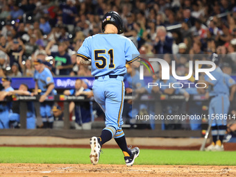 Anthony Maisano #51 of New York's Finest scores during the baseball game against the FDNY baseball team in the ''Battle of Badges'' at Citi...