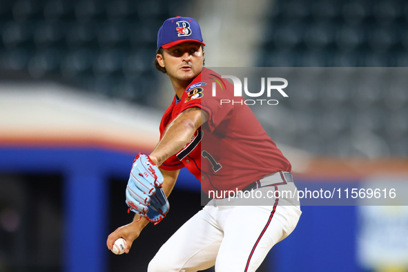 Tim Panetta #1 pitches during the baseball game against the NYPD baseball team in the 'Battle of Badges' at Citi Field in Corona, New York,...