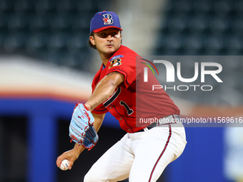 Tim Panetta #1 pitches during the baseball game against the NYPD baseball team in the 'Battle of Badges' at Citi Field in Corona, New York,...