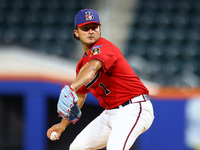 Tim Panetta #1 pitches during the baseball game against the NYPD baseball team in the 'Battle of Badges' at Citi Field in Corona, New York,...