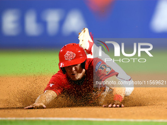 Brian Luebcke #4 advances to third base during the baseball game against the NYPD baseball team in the 'Battle of Badges' at Citi Field in C...