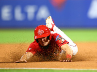 Brian Luebcke #4 advances to third base during the baseball game against the NYPD baseball team in the 'Battle of Badges' at Citi Field in C...