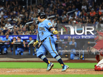 Ismael Perez #9 bats during the baseball game against the FDNY baseball team in the 'Battle of Badges' at Citi Field in Corona, N.Y., on Sep...