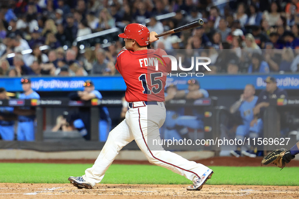 Joe Proscia #15 bats during the baseball game against the NYPD baseball team in the 'Battle of Badges' at Citi Field in Corona, New York, on...