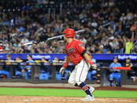 John Giakas #9 bats during the baseball game against the NYPD baseball team in the 'Battle of Badges' at Citi Field in Corona, New York, on...