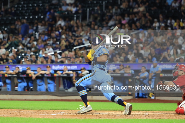 Paul Demartino #44 bats during the baseball game against the FDNY baseball team in the 'Battle of Badges' at Citi Field in Corona, New York,...