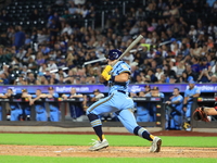 Paul Demartino #44 bats during the baseball game against the FDNY baseball team in the 'Battle of Badges' at Citi Field in Corona, New York,...