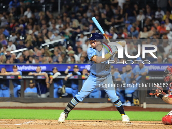 Anthony Carnacchio #23 bats during the baseball game against the FDNY baseball team in the 'Battle of Badges' at Citi Field in Corona, N.Y.,...