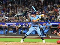 Anthony Carnacchio #23 bats during the baseball game against the FDNY baseball team in the 'Battle of Badges' at Citi Field in Corona, N.Y.,...