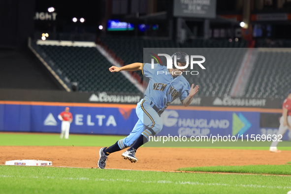 Anthony Maisano #51 of New York's Finest scores during the baseball game against the FDNY baseball team in the ''Battle of Badges'' at Citi...