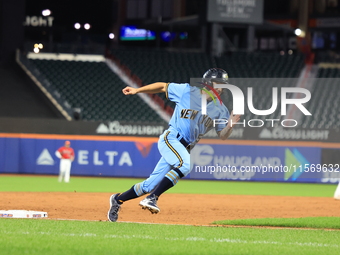 Anthony Maisano #51 of New York's Finest scores during the baseball game against the FDNY baseball team in the ''Battle of Badges'' at Citi...