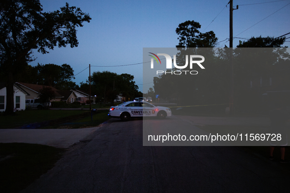 Police cars are near Bauer Pocket Park in Houston, Texas, on September 12, 2024, following a shooting. 