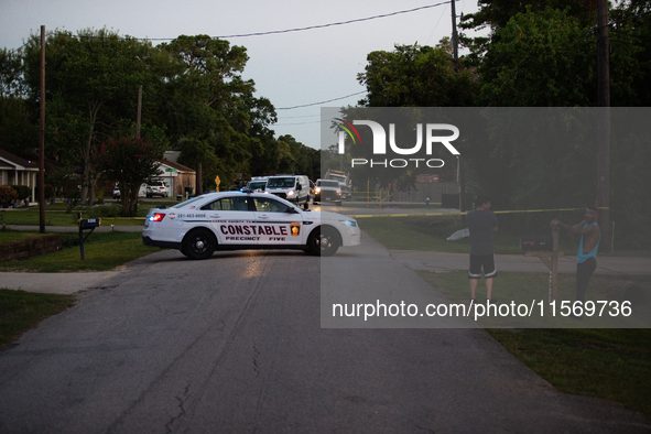 Houston Police investigate a double homicide at Bauer Pocket Park in Northwest Houston, on September 12, 2024. The shooting leaves two dead,...