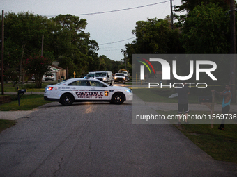 Houston Police investigate a double homicide at Bauer Pocket Park in Northwest Houston, on September 12, 2024. The shooting leaves two dead,...