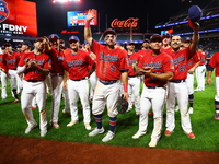 New York's Bravest acknowledge fans after the baseball game against the NYPD baseball team in the 'Battle of Badges' at Citi Field in Corona...