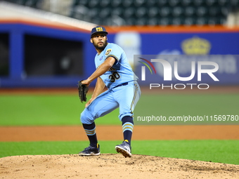 New York's Finest pitcher Jose Aquino #30 throws during the baseball game against the FDNY baseball team in the 'Battle of Badges' at Citi F...