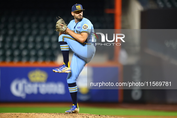 New York's Finest pitcher Ed Baram #45 throws during the baseball game against the FDNY baseball team in the 'Battle of Badges' at Citi Fiel...