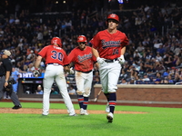 Matt Diorio #14 of New York's Bravest scores during the baseball game against the NYPD baseball team in the 'Battle of Badges' at Citi Field...