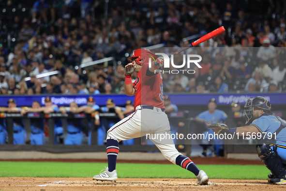 John Giakas #9 bats during the baseball game against the NYPD baseball team in the 'Battle of Badges' at Citi Field in Corona, New York, on...