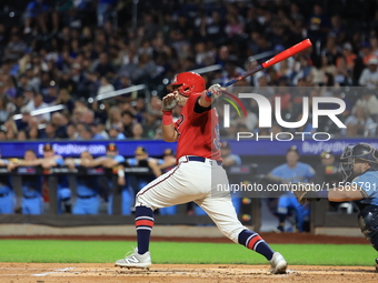 John Giakas #9 bats during the baseball game against the NYPD baseball team in the 'Battle of Badges' at Citi Field in Corona, New York, on...