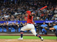 John Giakas #9 bats during the baseball game against the NYPD baseball team in the 'Battle of Badges' at Citi Field in Corona, New York, on...