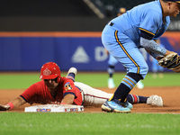 John Giakas #9 of New York's Bravest steals third base during the baseball game against the NYPD baseball team in the 'Battle of Badges' at...