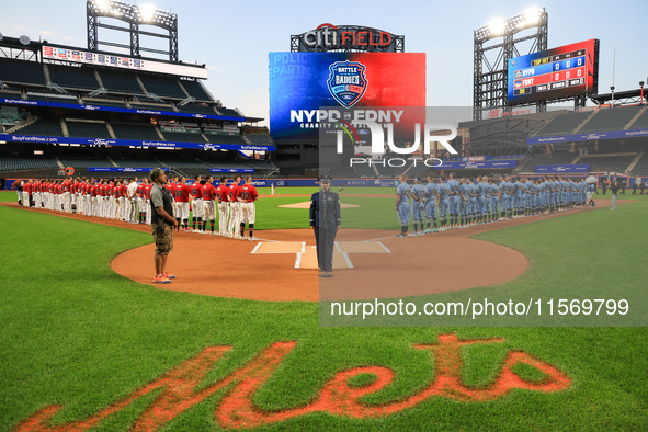 The national anthem is performed before the 'Battle of Badges' at Citi Field in Corona, N.Y., on September 12, 2024. 