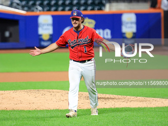 Tim Panetta #1, a pitcher for New York's Bravest, reacts as he comes off the field during the seventh inning of the baseball game against th...