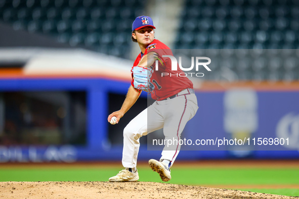 Tim Panetta #1 pitches during the baseball game against the NYPD baseball team in the 'Battle of Badges' at Citi Field in Corona, New York,...