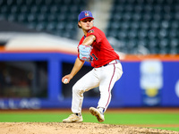 Tim Panetta #1 pitches during the baseball game against the NYPD baseball team in the 'Battle of Badges' at Citi Field in Corona, New York,...