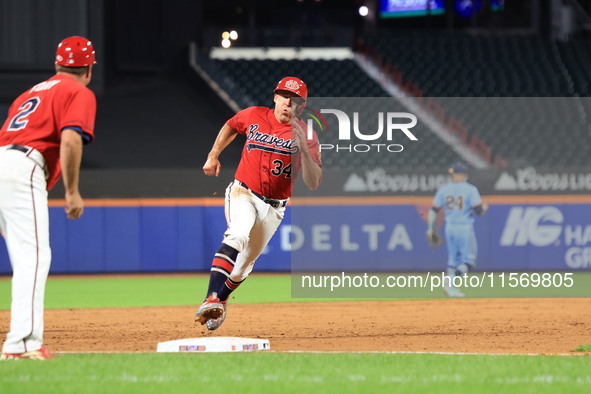 Dan Quinn #34 of New York's Bravest runs out a ball during the baseball game against the NYPD baseball team in the 'Battle of Badges' at Cit...