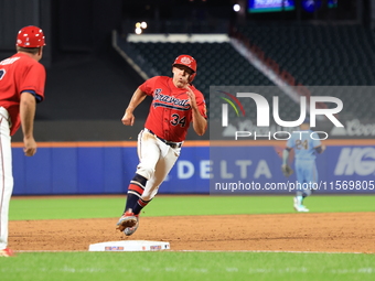 Dan Quinn #34 of New York's Bravest runs out a ball during the baseball game against the NYPD baseball team in the 'Battle of Badges' at Cit...