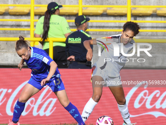 Cora Zicai of Germany and Luciana Perez of Argentina fight for the ball during the FIFA U-20 Women's World Cup 2024 match between Germany an...