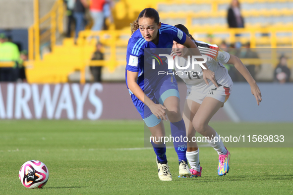 Loreen Bender of Germany and Delfina Lombardi of Argentina fight for the ball during the FIFA U-20 Women's World Cup 2024 match between Germ...