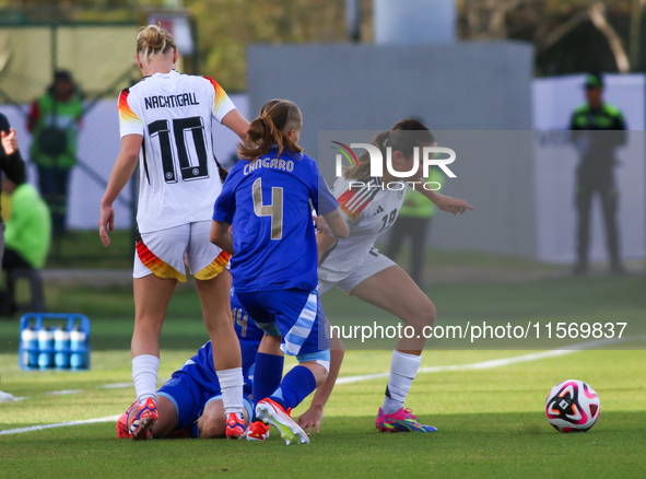 Loreen Bender of Germany and Juana Cangaro of Argentina fight for the ball during the FIFA U-20 Women's World Cup 2024 match between Germany...