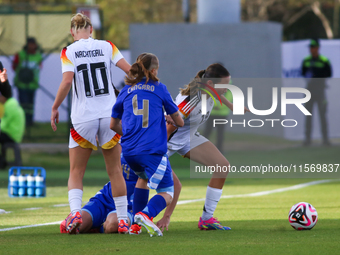 Loreen Bender of Germany and Juana Cangaro of Argentina fight for the ball during the FIFA U-20 Women's World Cup 2024 match between Germany...