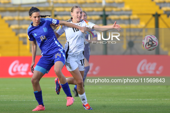 Sophie Nachtigall of Germany and Serena Rodriguez of Argentina fight for the ball during the FIFA U-20 Women's World Cup 2024 match between...