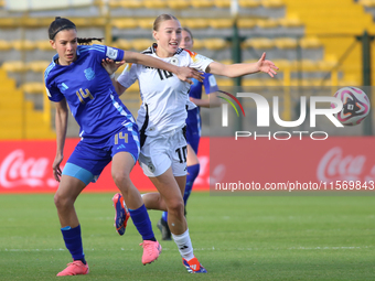 Sophie Nachtigall of Germany and Serena Rodriguez of Argentina fight for the ball during the FIFA U-20 Women's World Cup 2024 match between...