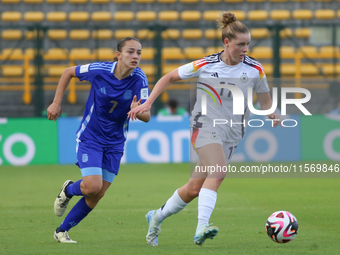 Alara Sehitler of Germany and Delfina Lombardi of Argentina fight for the ball during the 2024 FIFA U-20 Women's World Cup match between Ger...